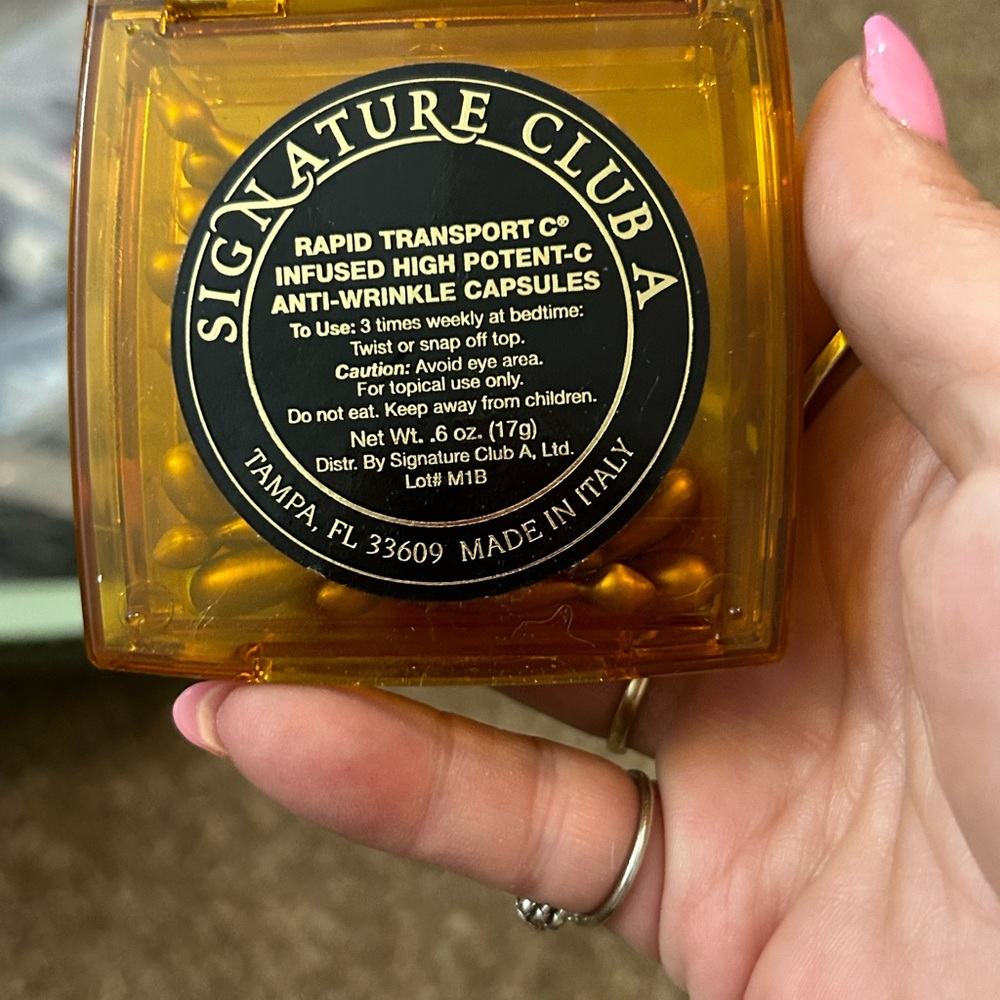 Signature Club A. Rapid transport C. Infused high potent Anti-wrinkle capsules.